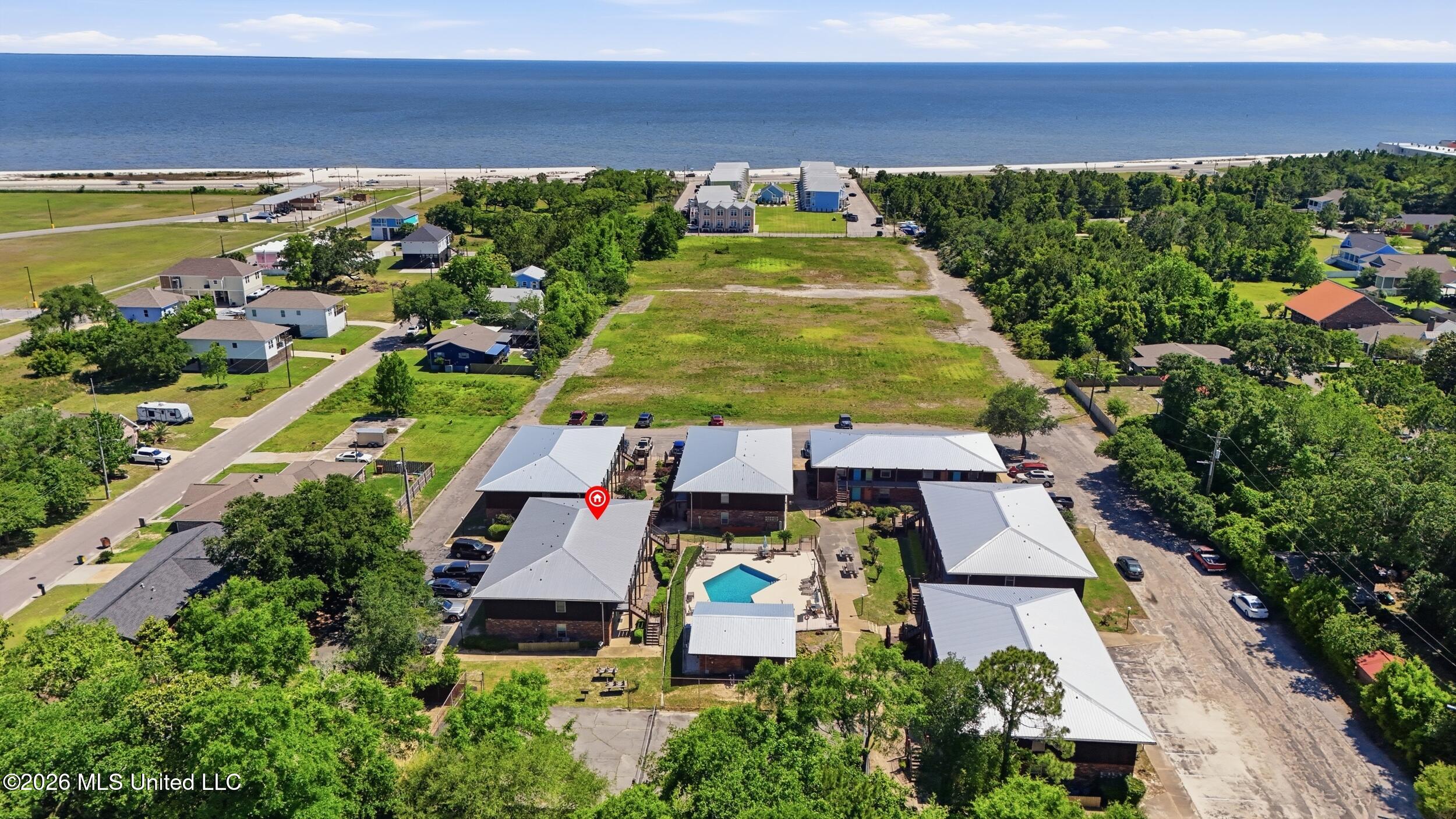 1550 East 2nd Street, Unit R105 Pass Christian, MS 39571 - Photo 31 of 36 34_dji_20260504145014_0053_d_stamped_239