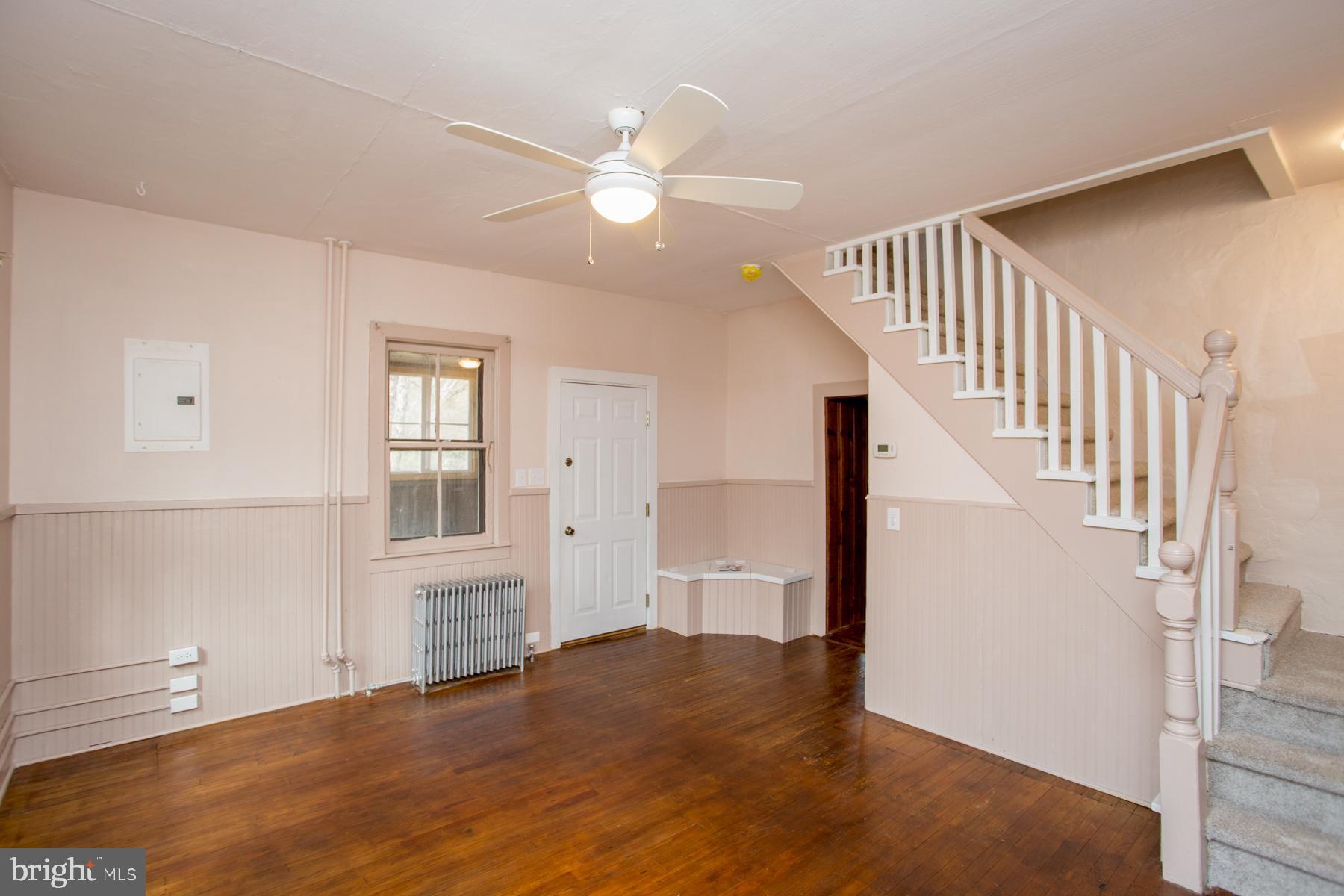 120 Tabor Road Ottsville, PA 18942 - Photo 11 of 60 a view of empty room with wooden floor and fan