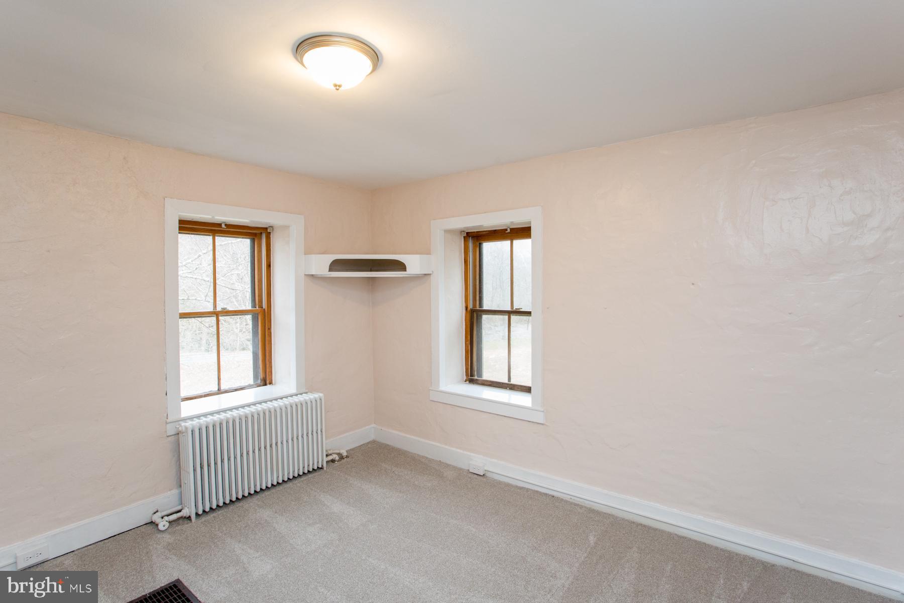 120 Tabor Road Ottsville, PA 18942 - Photo 12 of 60 an empty room with windows