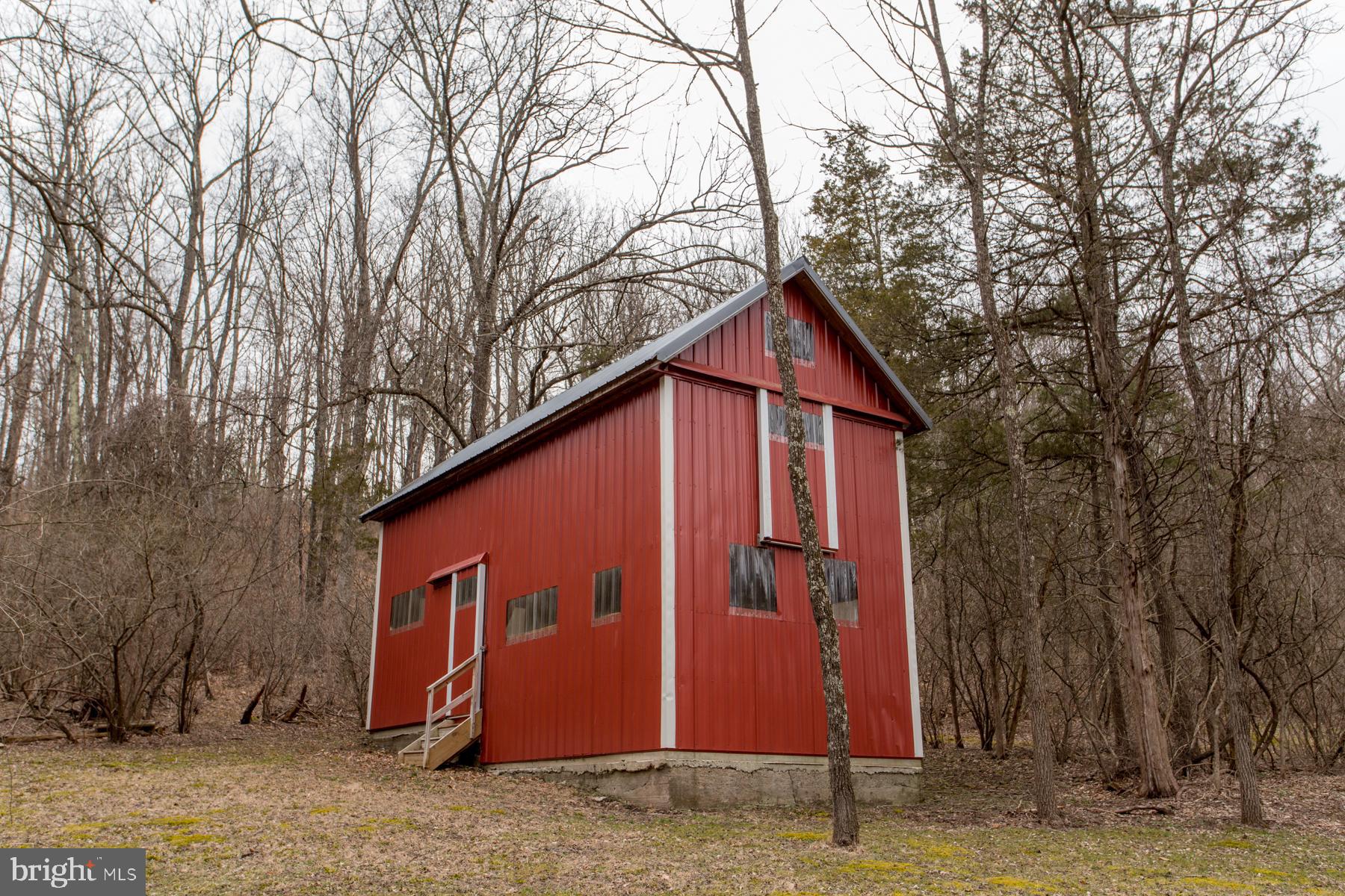 120 Tabor Road Ottsville, PA 18942 - Photo 19 of 60 a house with trees in front of it