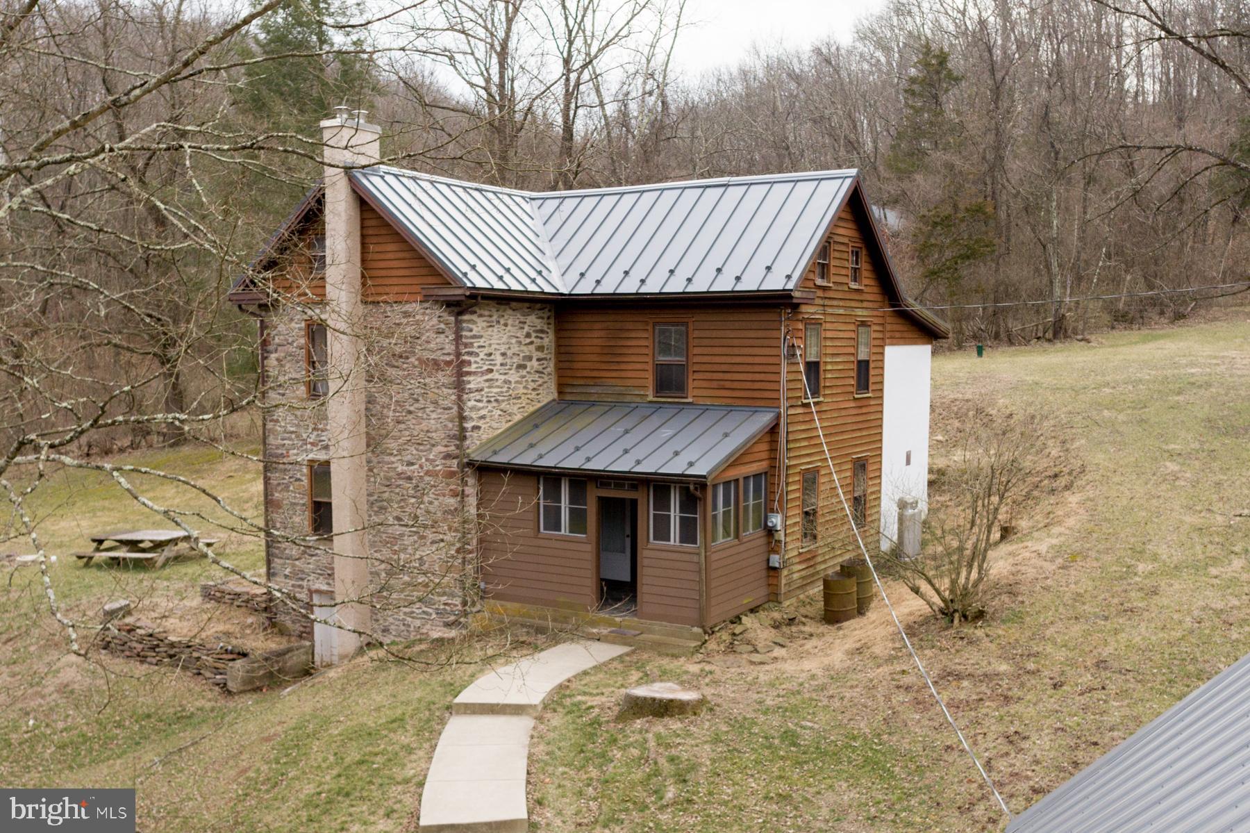 120 Tabor Road Ottsville, PA 18942 - Photo 25 of 60 a view of a house with a roof deck