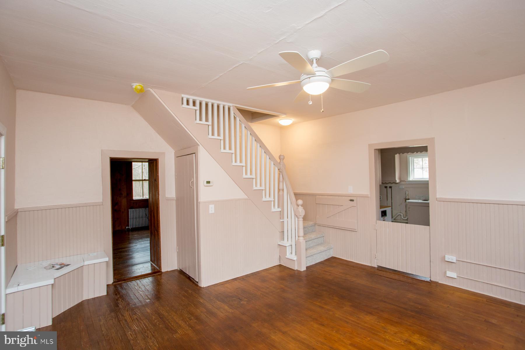120 Tabor Road Ottsville, PA 18942 - Photo 28 of 60 a view of a livingroom with wooden floor and stairs
