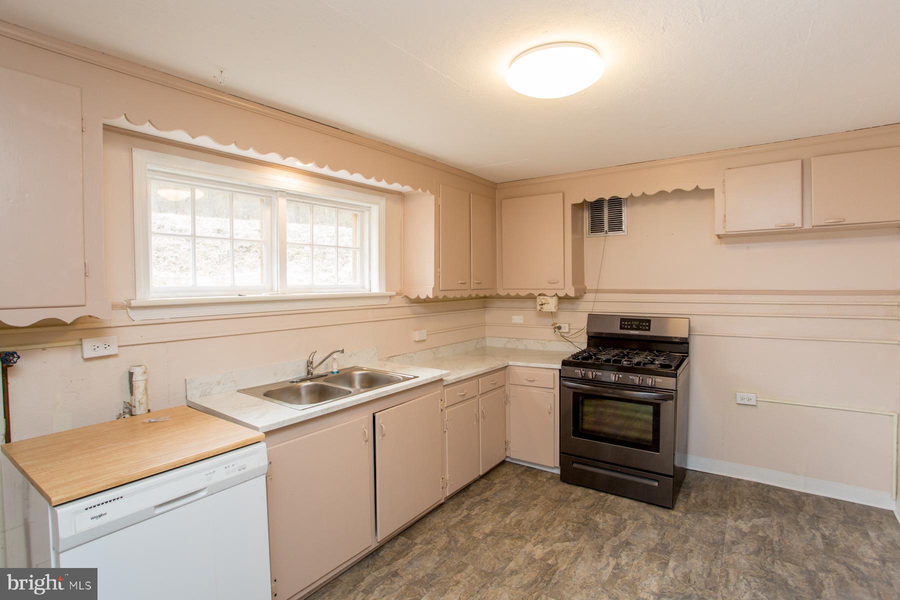 120 Tabor Road Ottsville, PA 18942 - Photo 33 of 60 a kitchen that has a sink and a stove