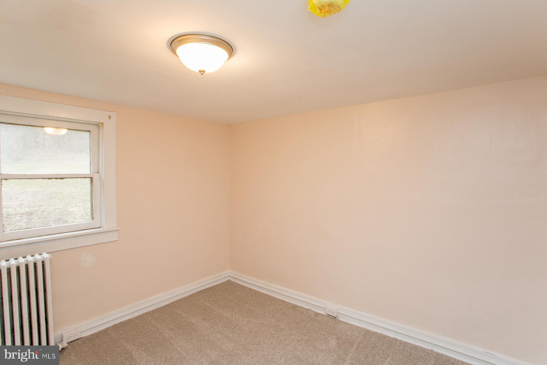 120 Tabor Road Ottsville, PA 18942 - Photo 41 of 60 an empty room with a window