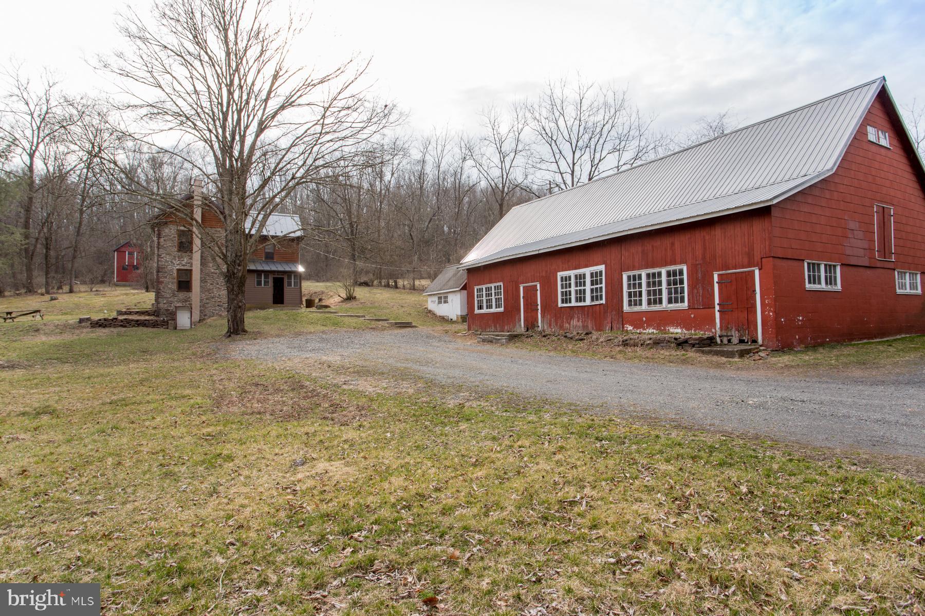 120 Tabor Road Ottsville, PA 18942 - Photo 51 of 60 a view of a house with a yard covered in snow