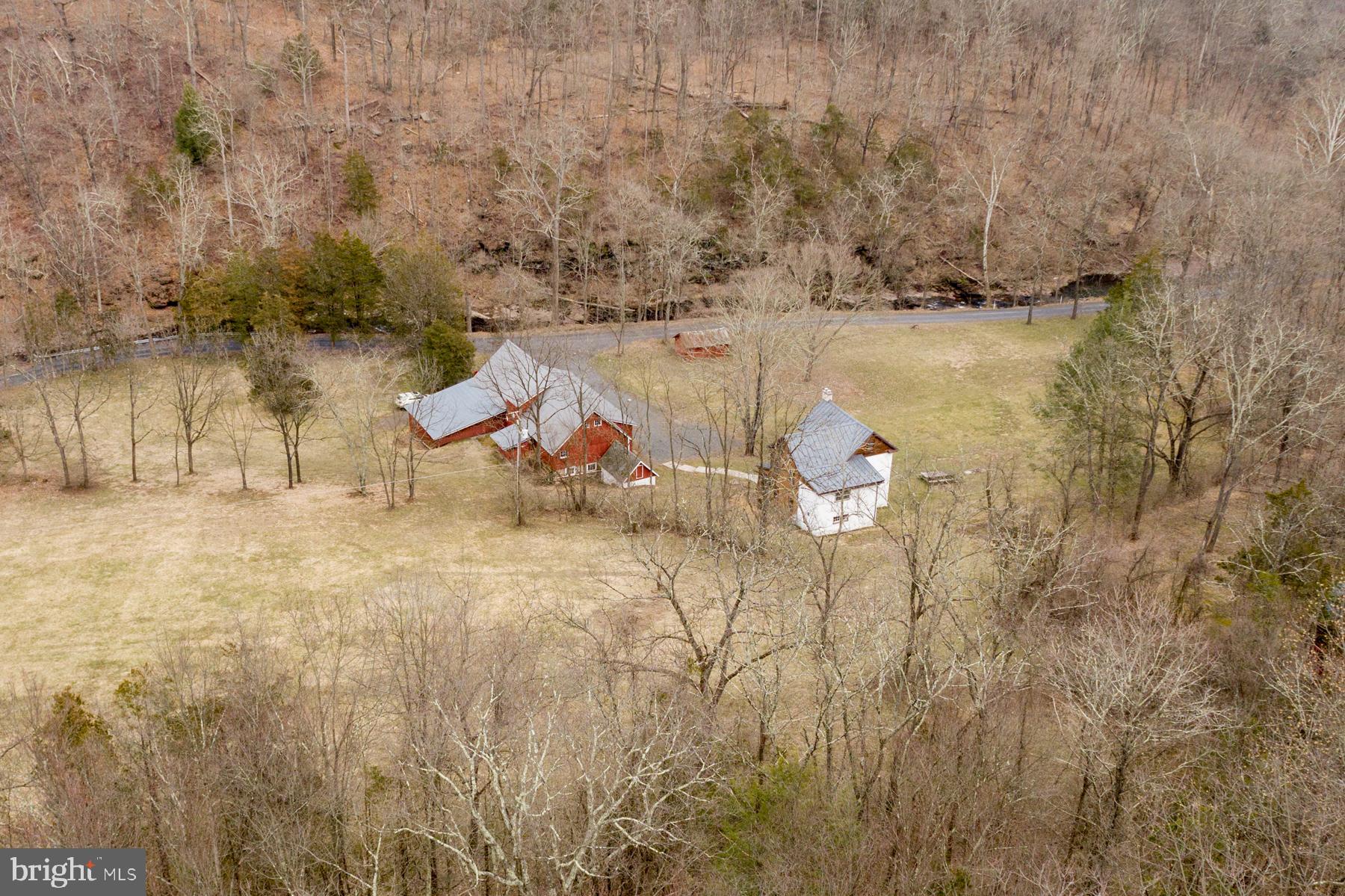 120 Tabor Road Ottsville, PA 18942 - Photo 57 of 60 a backyard of a house with table and chairs