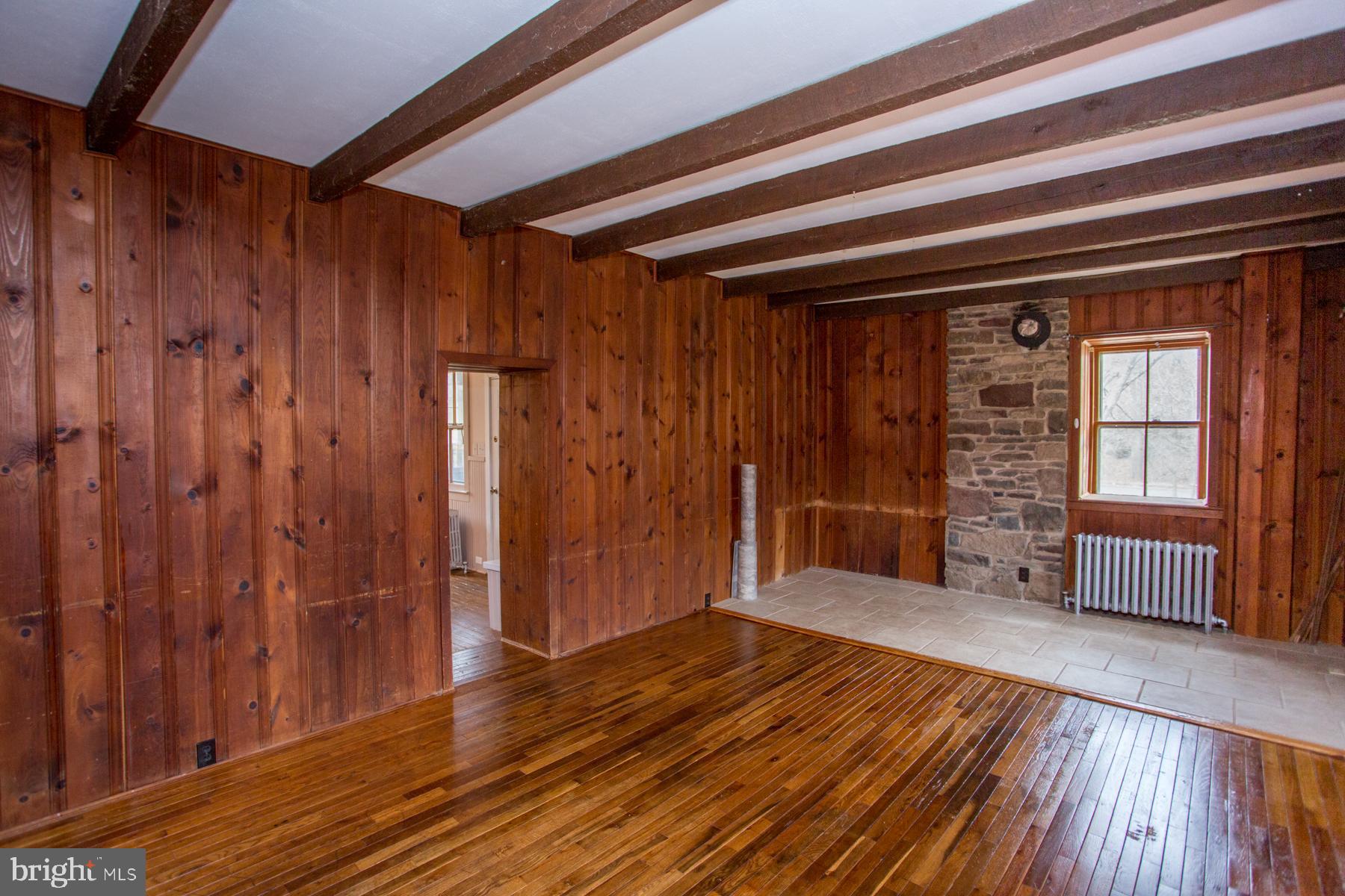 120 Tabor Road Ottsville, PA 18942 - Photo 10 of 60 a view of empty room with wooden floor and fan