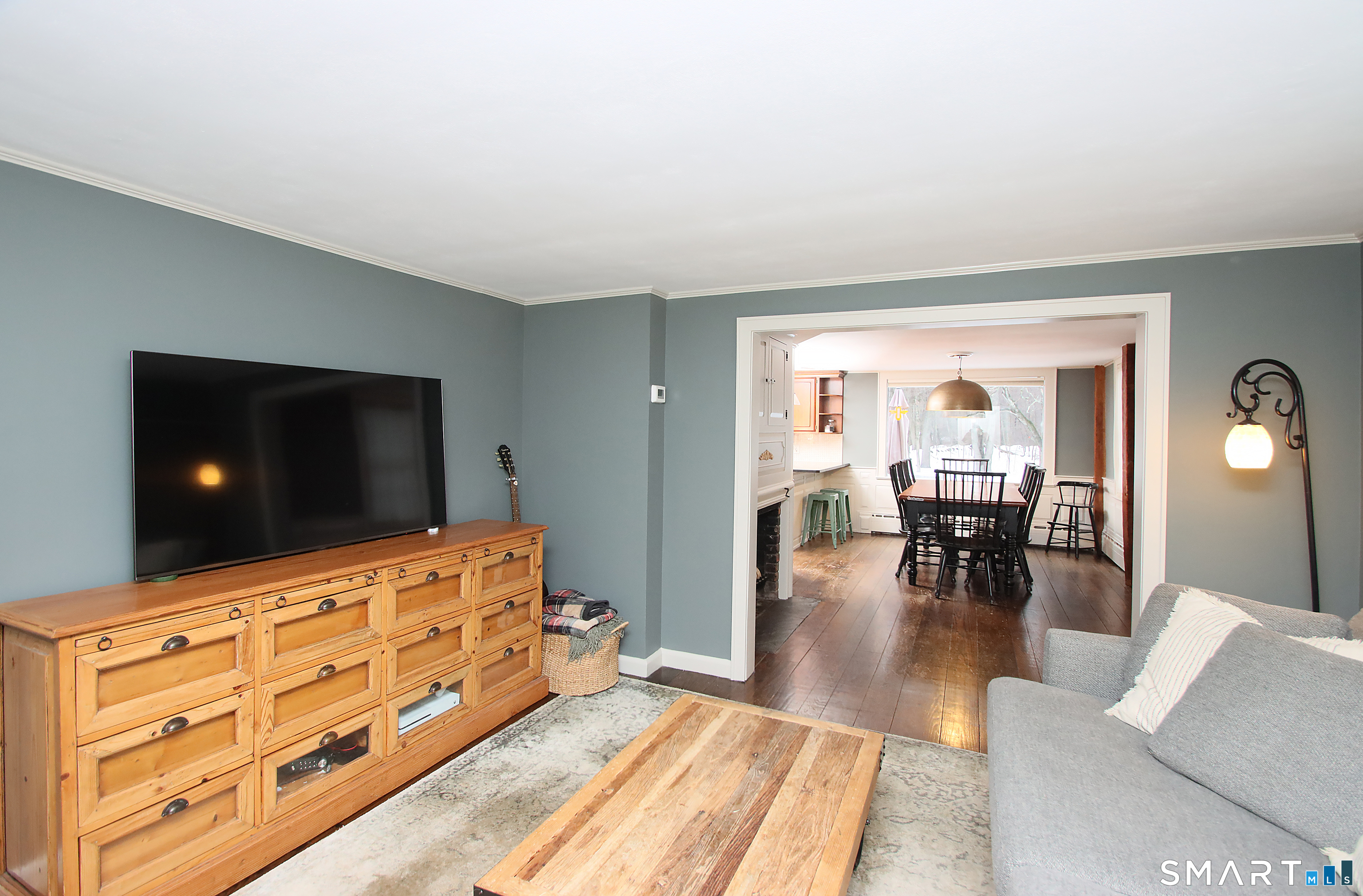 455 Barn Hill Road Monroe, CT 06468 - Photo 10 of 34 Living room flows into the dining room