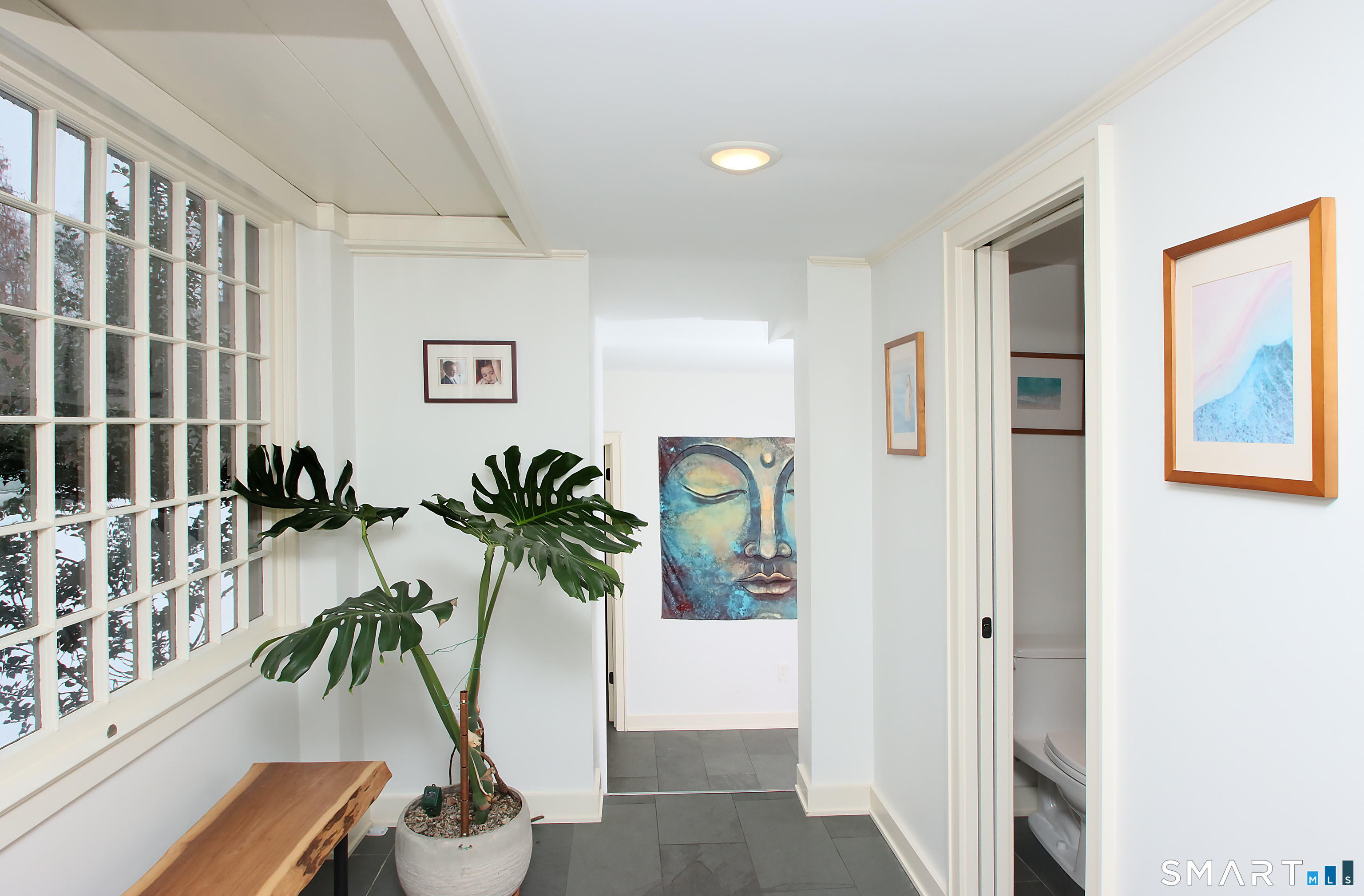455 Barn Hill Road Monroe, CT 06468 - Photo 14 of 34 Foyer with half bath, mudroom, leads to main level laundry room