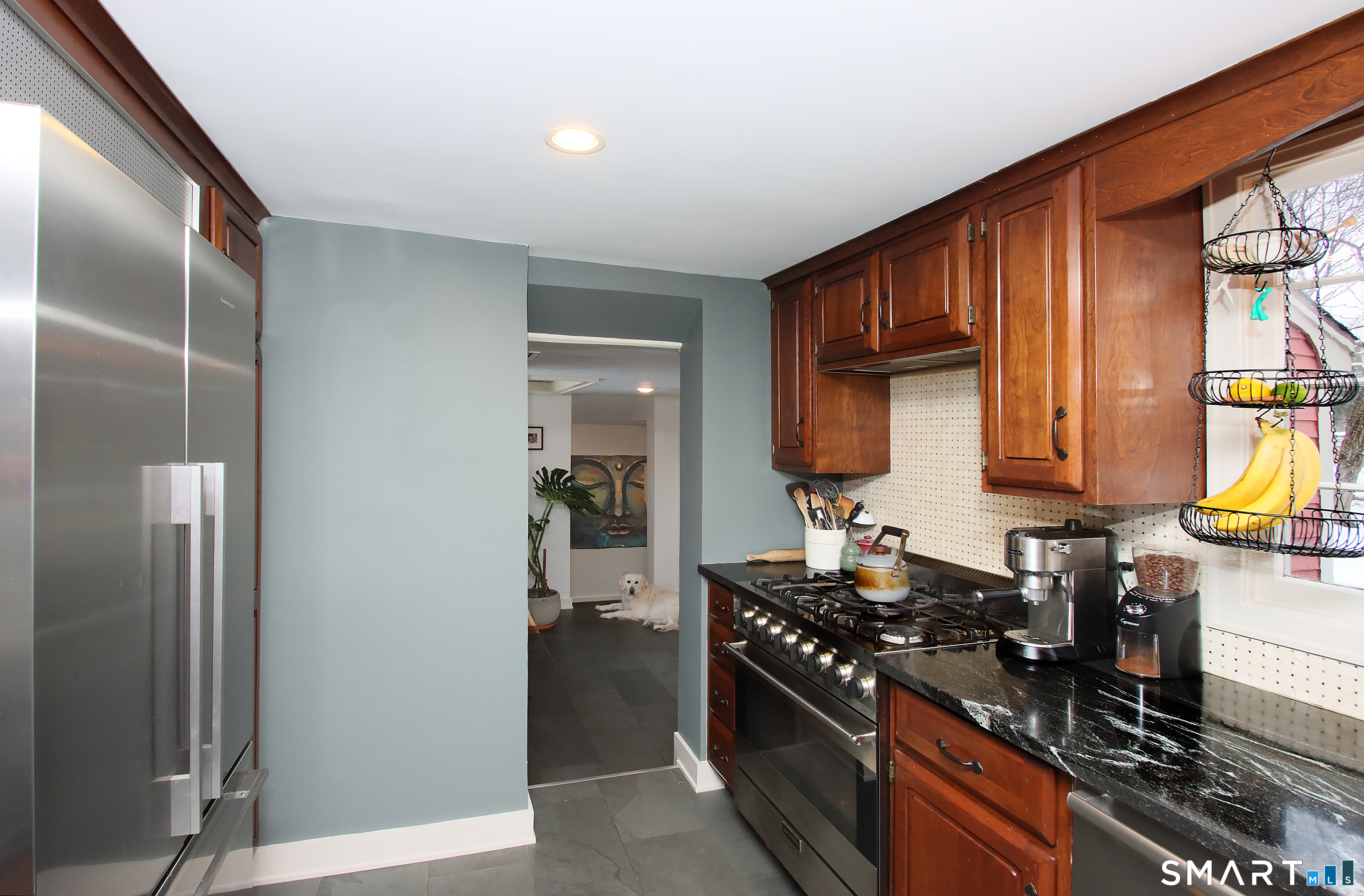 455 Barn Hill Road Monroe, CT 06468 - Photo 3 of 34 Spacious kitchen features granite counters and slate flooring