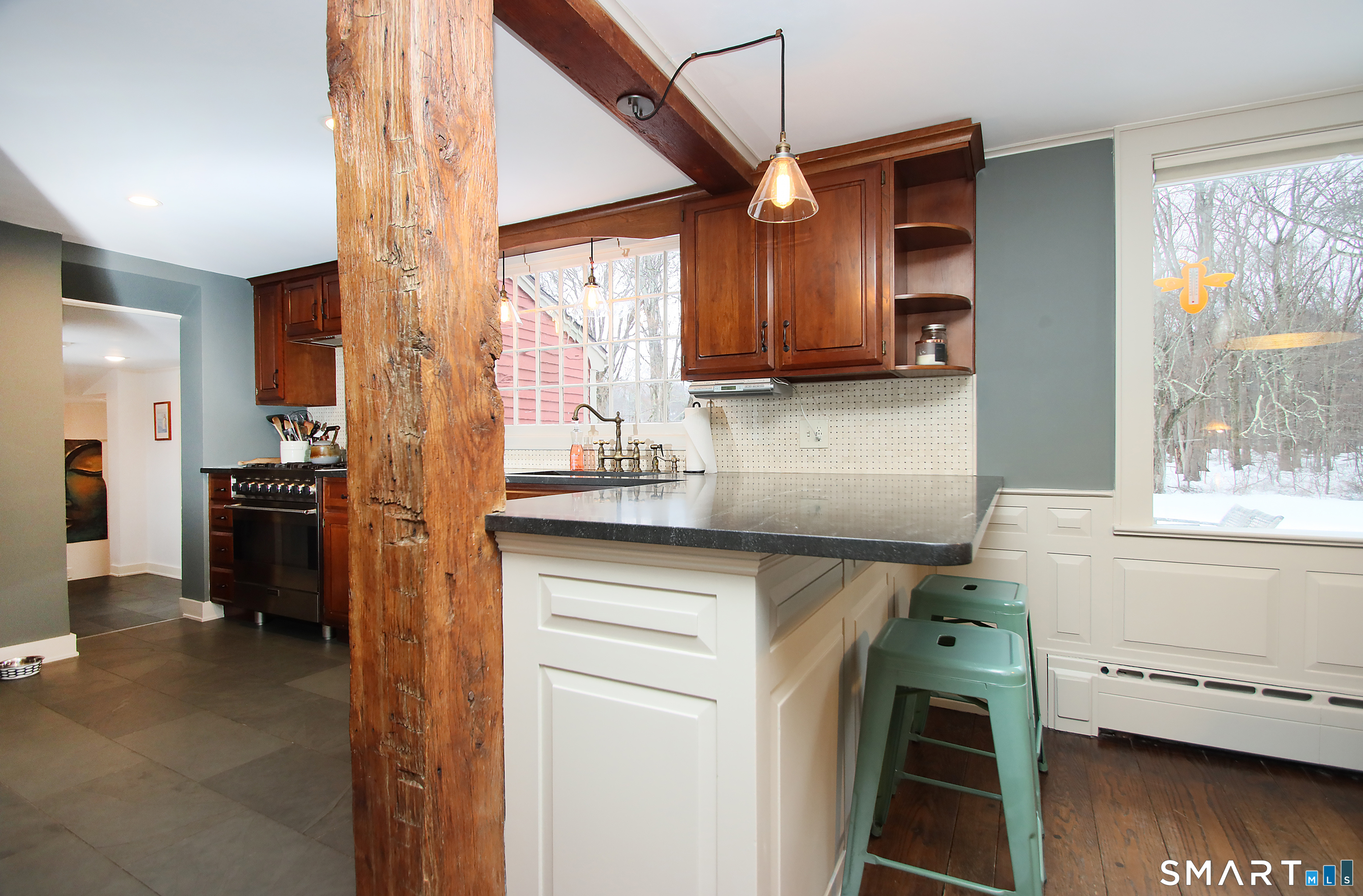 455 Barn Hill Road Monroe, CT 06468 - Photo 34 of 34 Breakfast bar and open floor plan to dining room