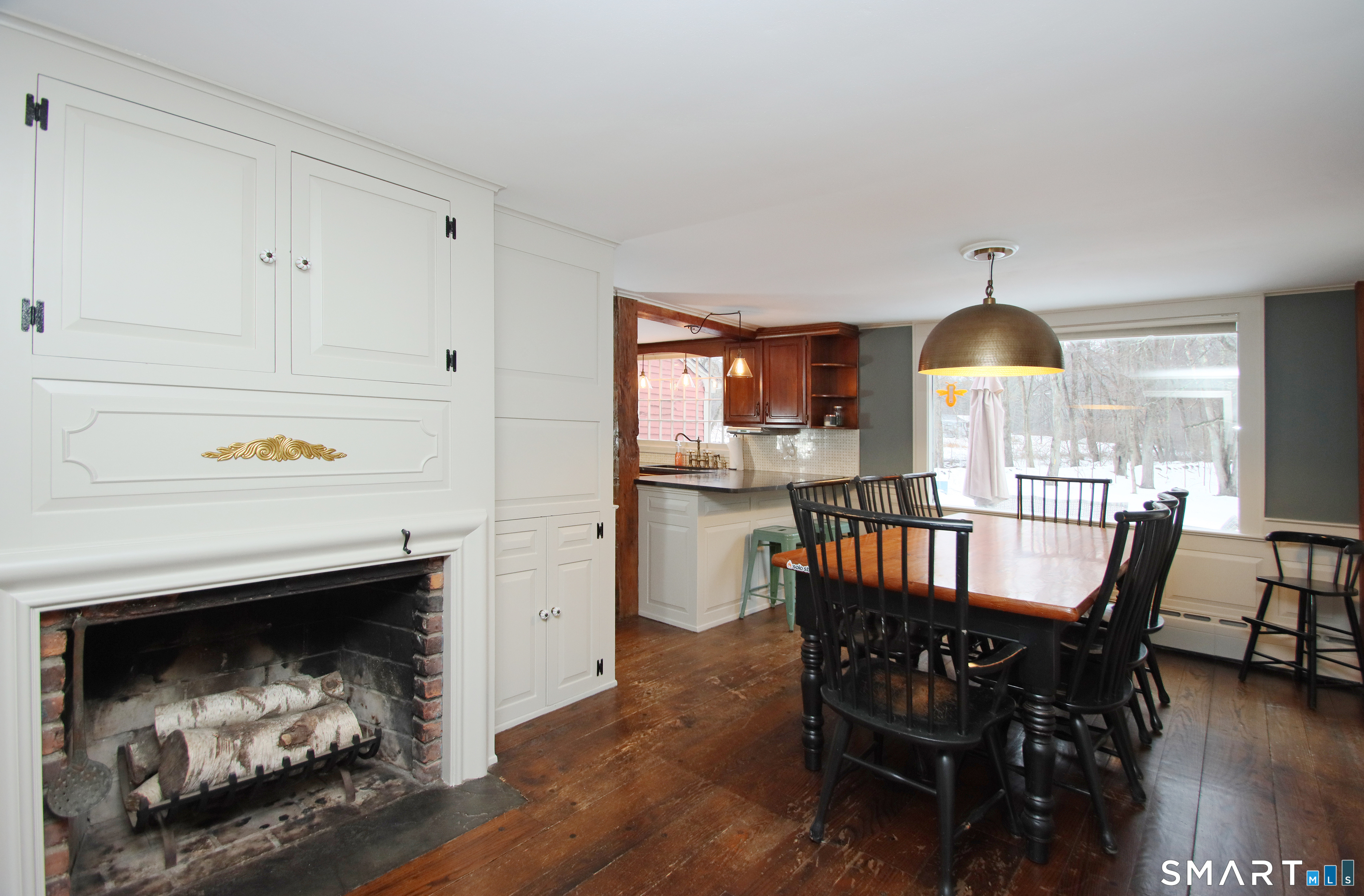 455 Barn Hill Road Monroe, CT 06468 - Photo 7 of 34 Dining room features accent fireplace and period trim