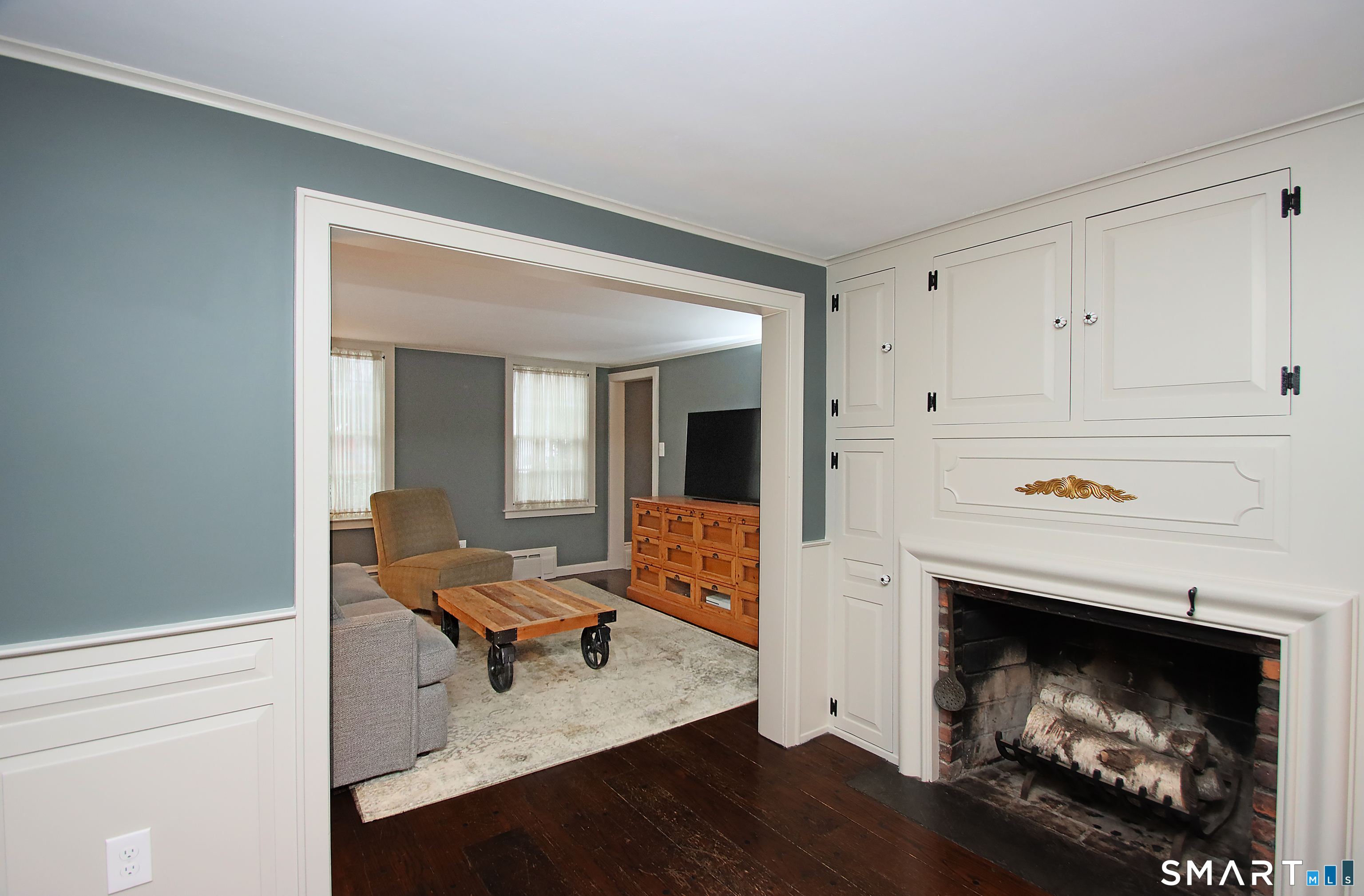 455 Barn Hill Road Monroe, CT 06468 - Photo 8 of 34 Dining room accent fireplace and built ins