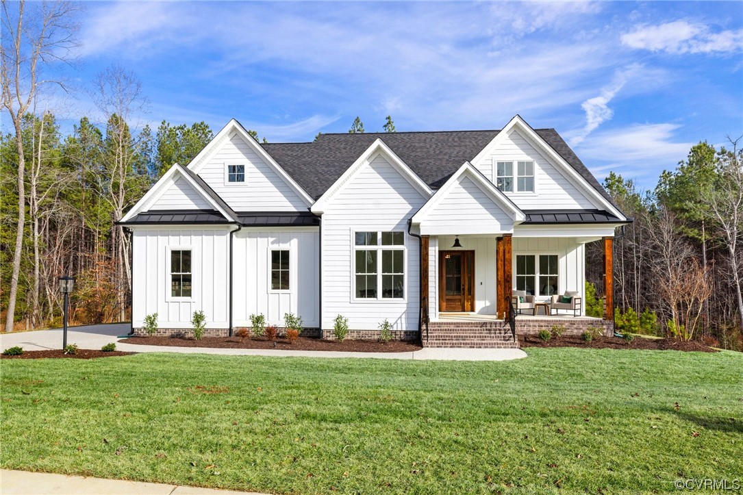 5143 Lake Summer Loop Moseley, VA 23120 - Photo 2 of 49 front view of a house with a yard