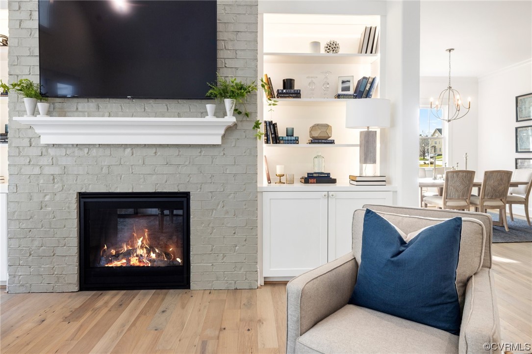 5143 Lake Summer Loop Moseley, VA 23120 - Photo 27 of 49 a living room with furniture and a fireplace