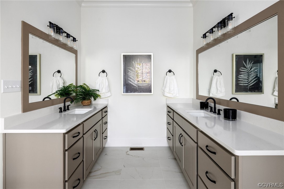5143 Lake Summer Loop Moseley, VA 23120 - Photo 34 of 49 a spacious bathroom with a double vanity sink and a mirror