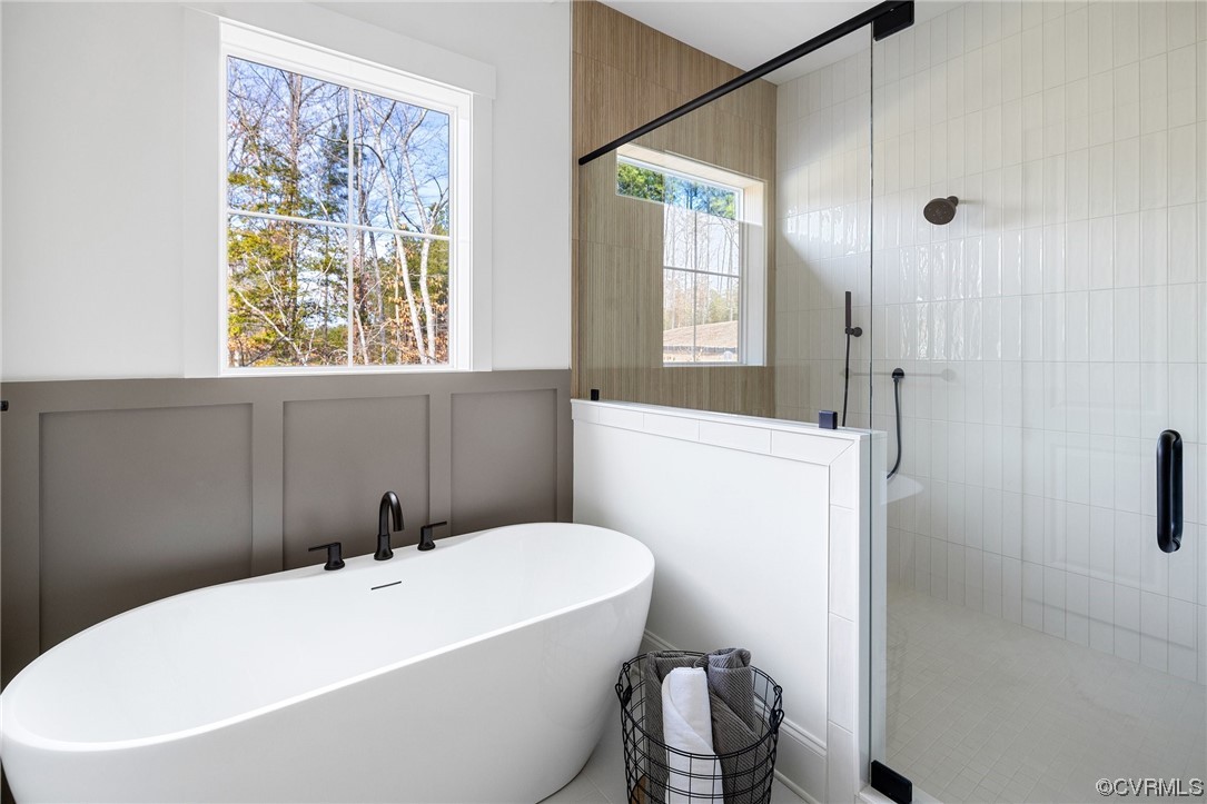 5143 Lake Summer Loop Moseley, VA 23120 - Photo 35 of 49 a white bath tub sitting next to a white toilet
