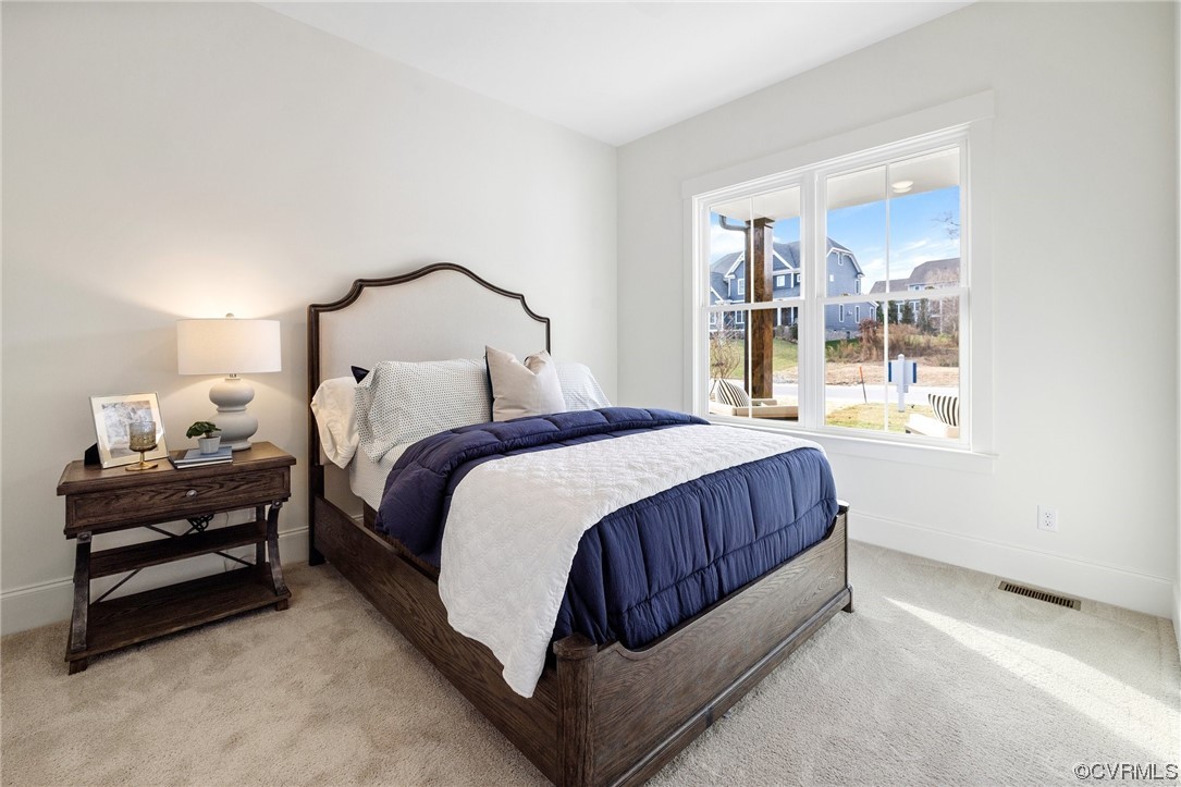 5143 Lake Summer Loop Moseley, VA 23120 - Photo 8 of 49 a bedroom with a bed and window