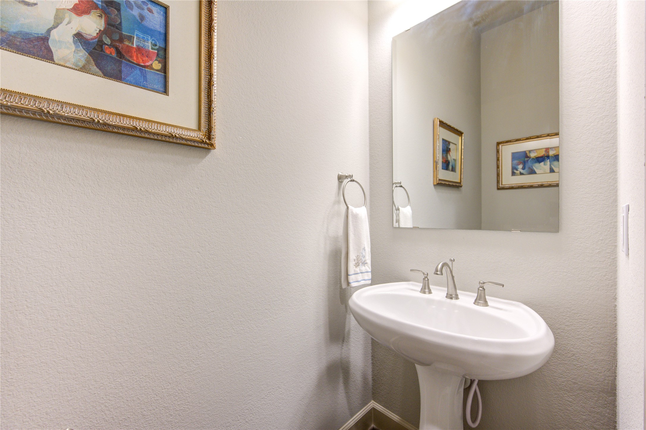 7326 Orangetip Road Katy, TX 77493 - Photo 26 of 43 Compact yet functional, this well-appointed half bath provides convenience and charm, making it a perfect addition to the home.