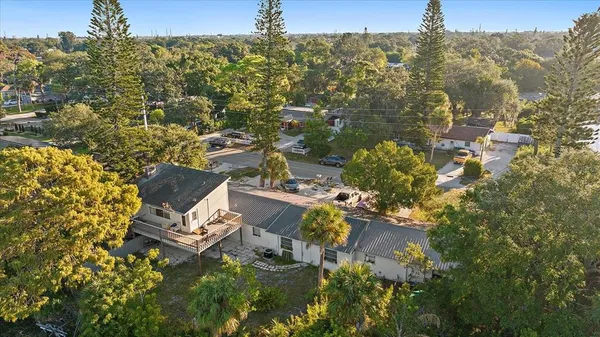 an aerial view of residential house with outdoor space