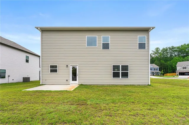 a house view with a backyard space
