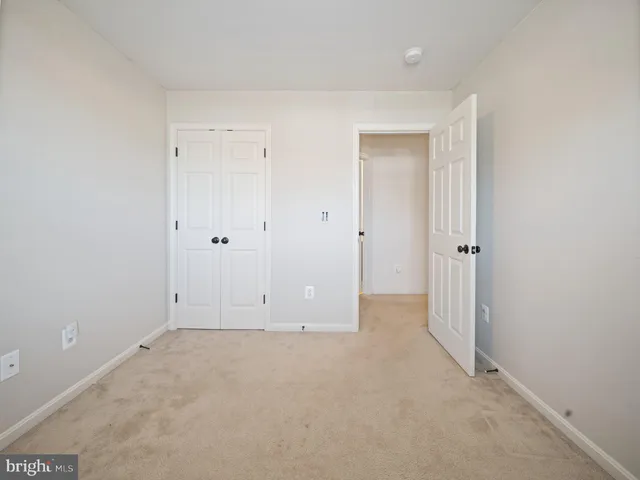 a view of a elevator with wooden floor