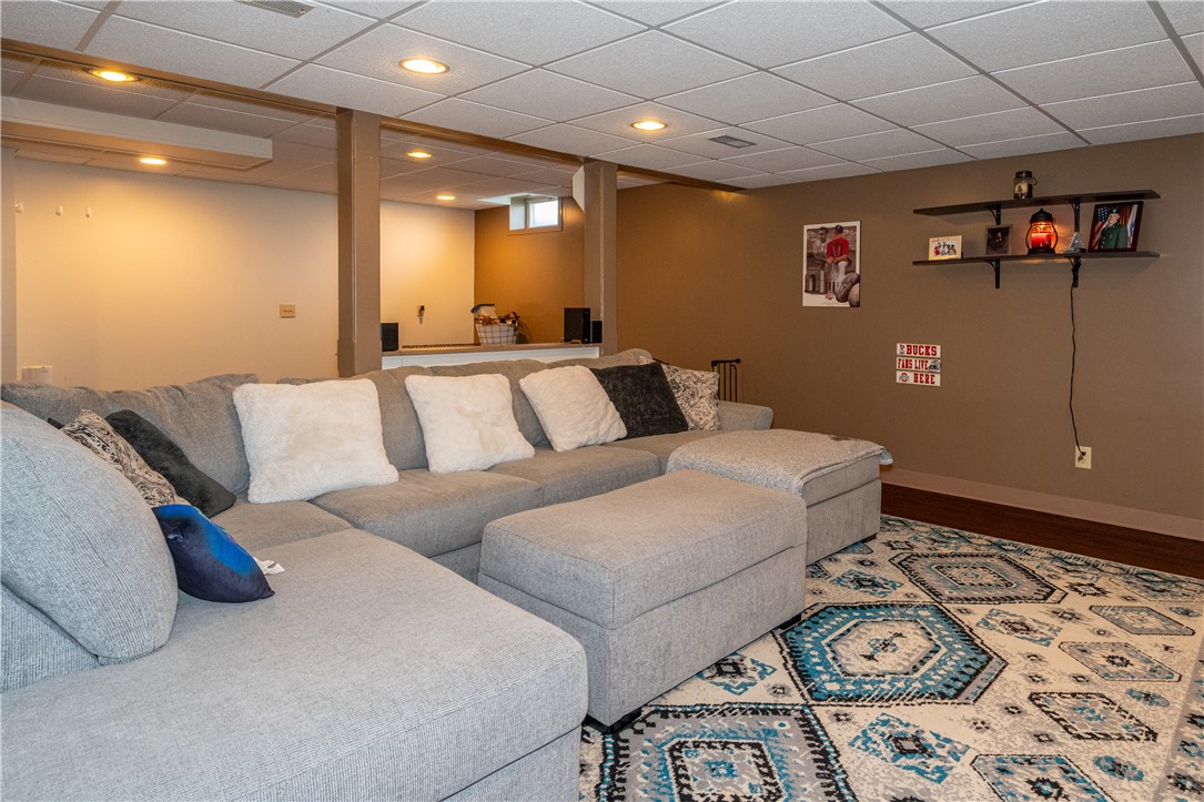 3628 Petre Road Springfield, OH 45502 - Photo 33 of 52 This finished basement offers an inviting space for relaxation and entertainment.