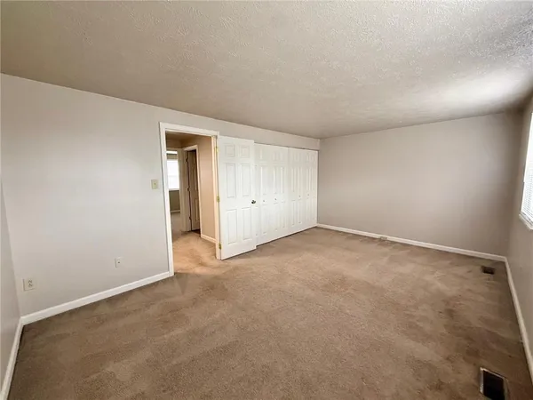 an empty room with an entryway