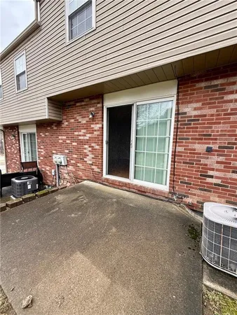 a view of a house with a street