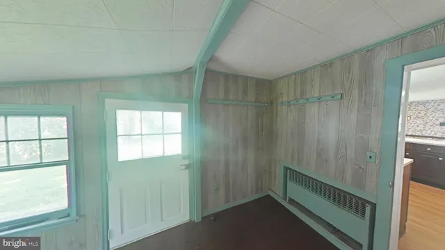 a view of hallway with windows