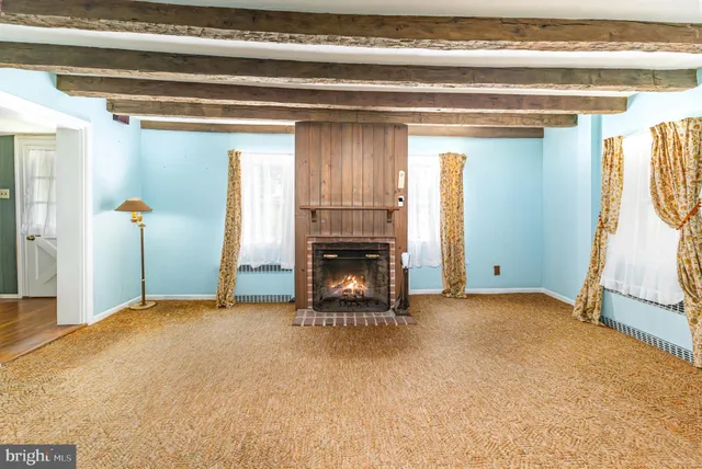 a view of a livingroom with a fireplace