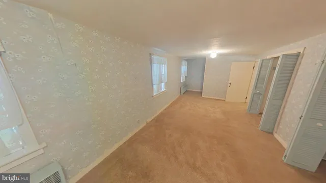 a view of hallway with stairs