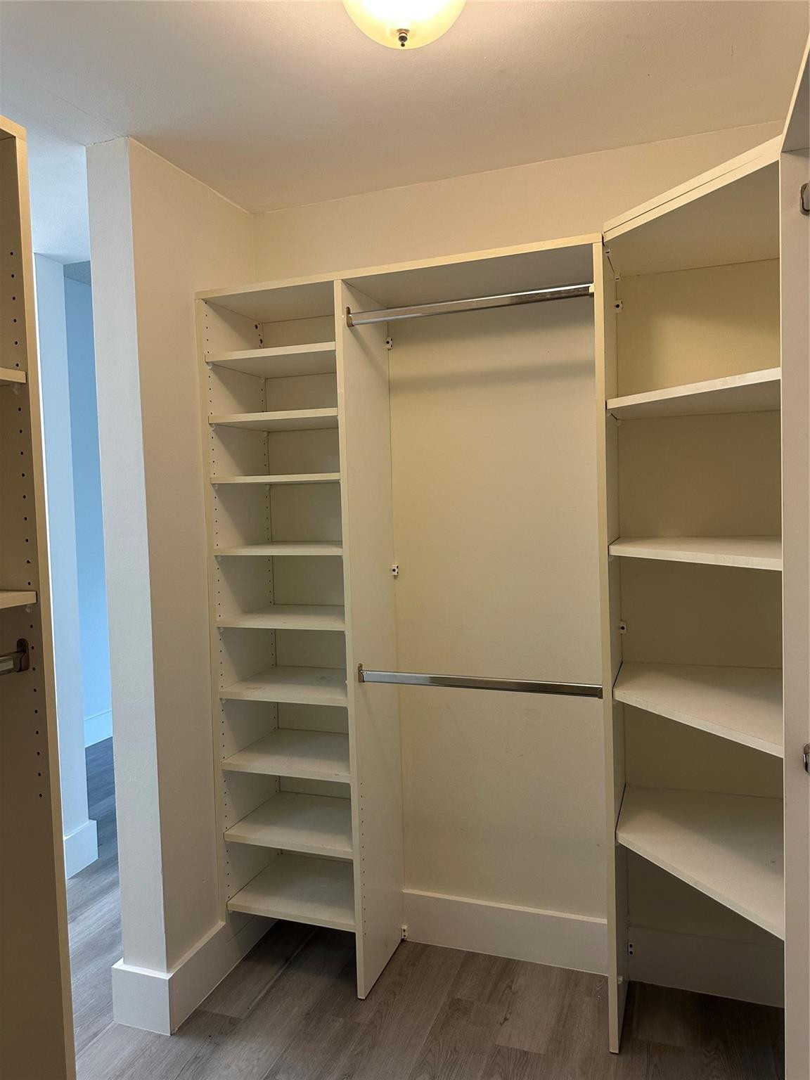 159 Northwest 70th Street, Unit 517 Boca Raton, FL 33487 - Photo 21 of 30 a view of walk in closet with empty racks