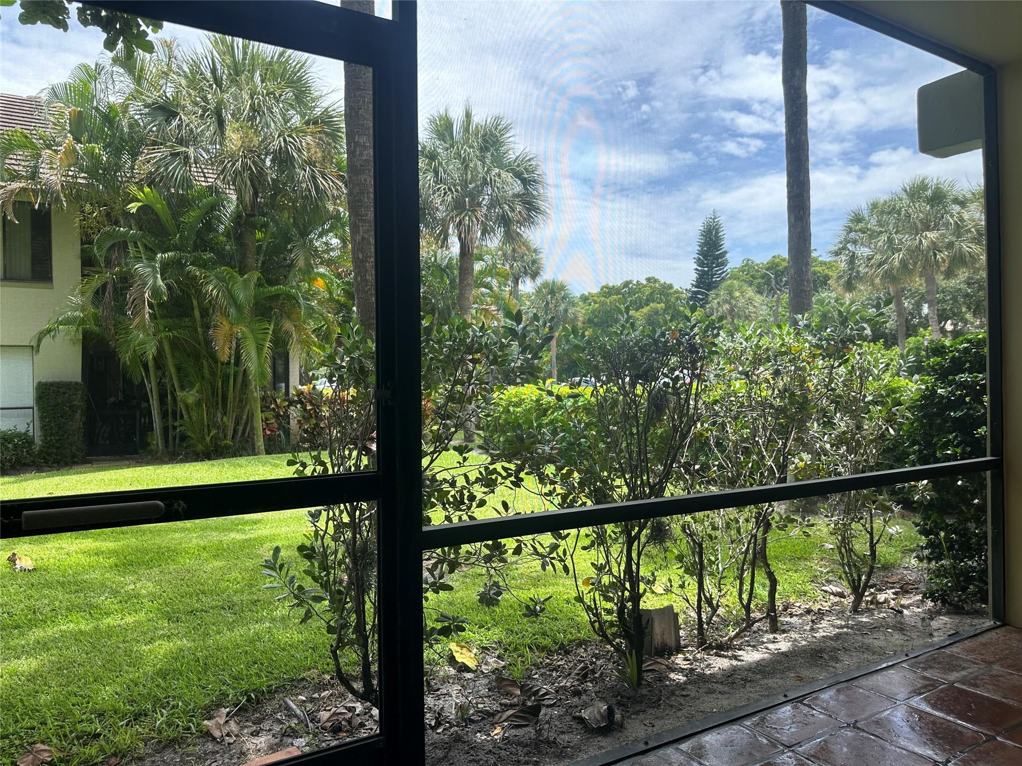 159 Northwest 70th Street, Unit 517 Boca Raton, FL 33487 - Photo 27 of 30 a view of outdoor with green space