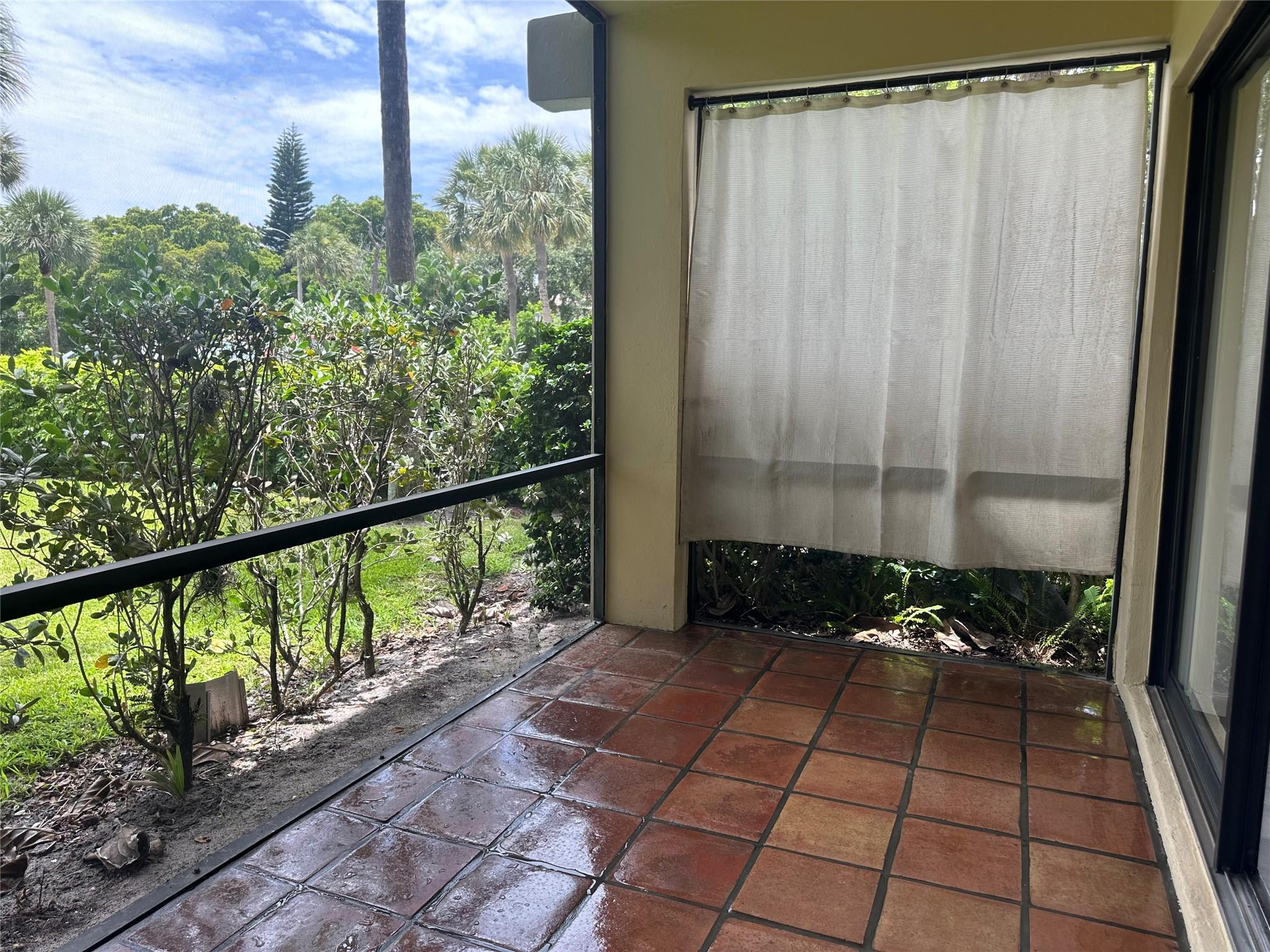 159 Northwest 70th Street, Unit 517 Boca Raton, FL 33487 - Photo 28 of 30 a view of a balcony with wooden floor