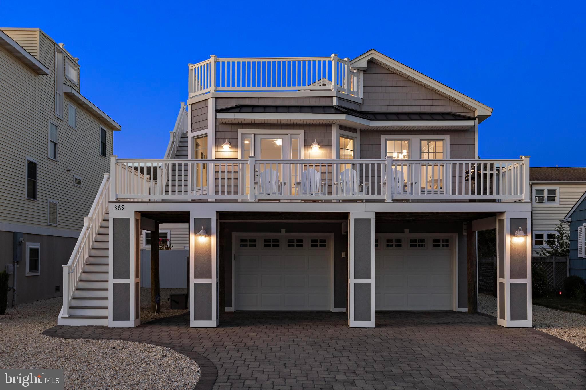 369 West 10th Street Ship Bottom, NJ 08008 - Photo 11 of 110 a view of a house with entryway and stairs