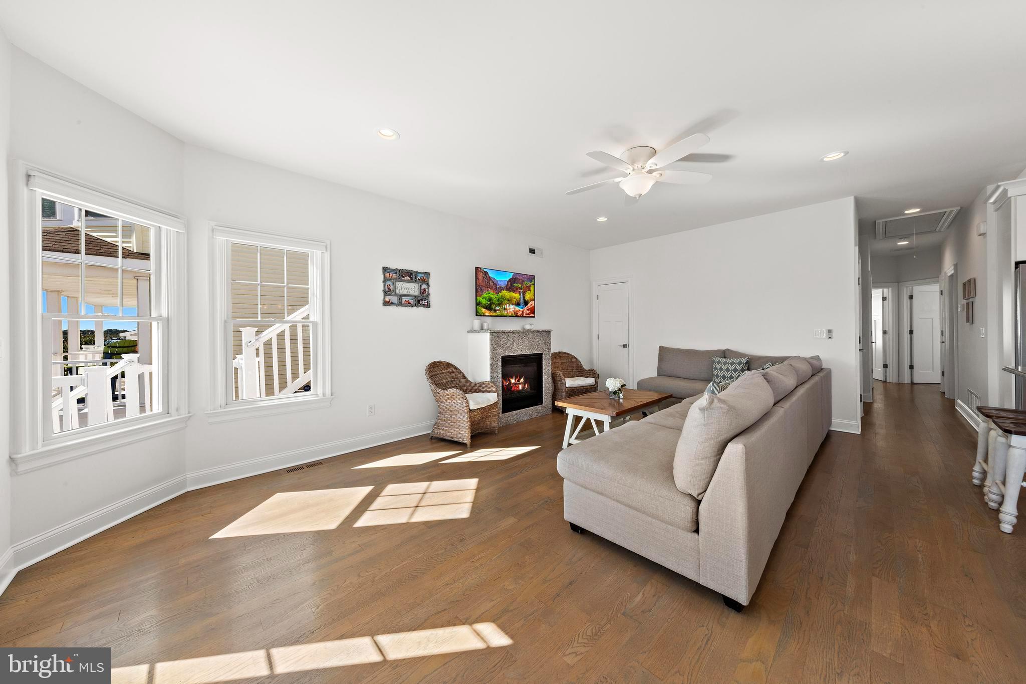 369 West 10th Street Ship Bottom, NJ 08008 - Photo 27 of 110 a living room with furniture and a window