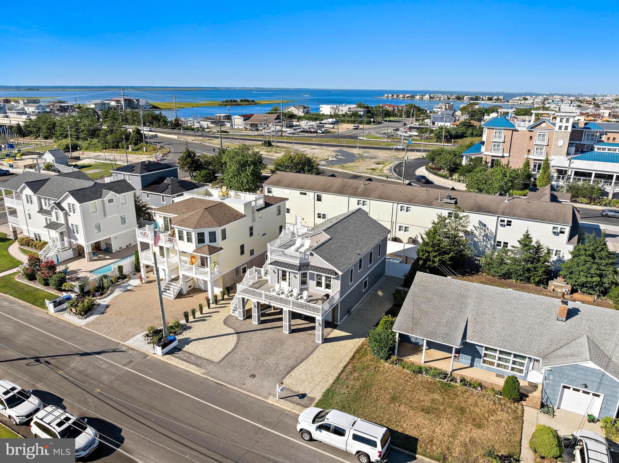 369 West 10th Street Ship Bottom, NJ 08008 - Photo 80 of 110 an aerial view of residential building with parking