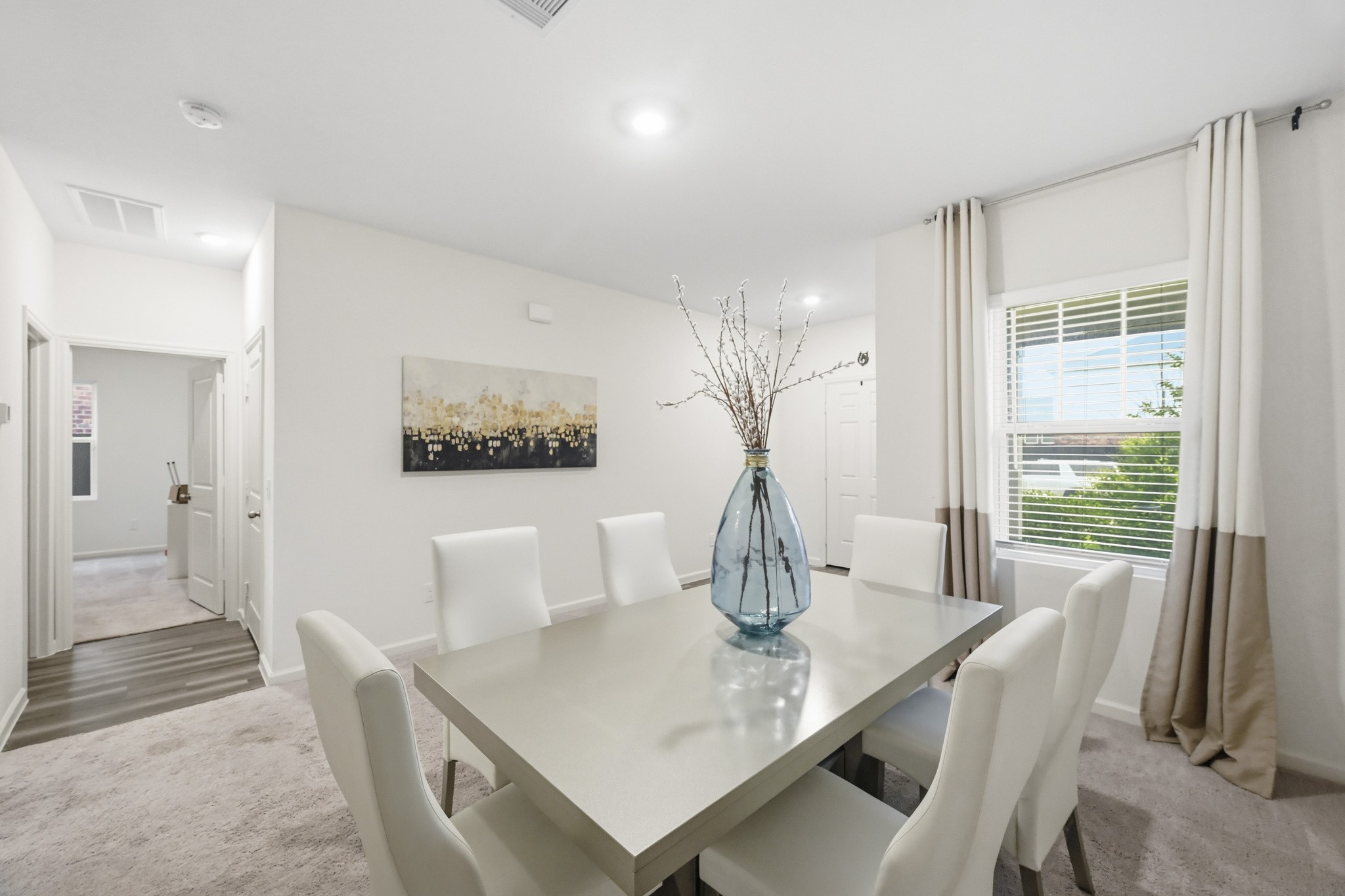 7207 Evitale Way Houston, TX 77049 - Photo 15 of 43 a view of a dining room with furniture window and outside view