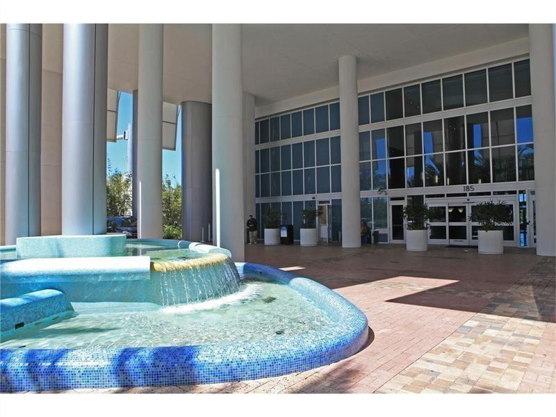 185 Southwest 7th Street, Unit 3507 Miami, FL 33130 - Photo 16 of 19 a view of a swimming pool with outdoor seating