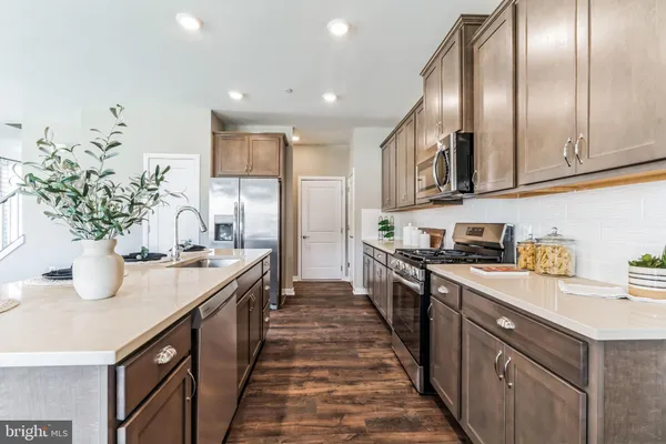 a kitchen with granite countertop lots of counter top space