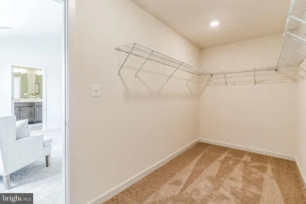 a view of a room with racks on the wall