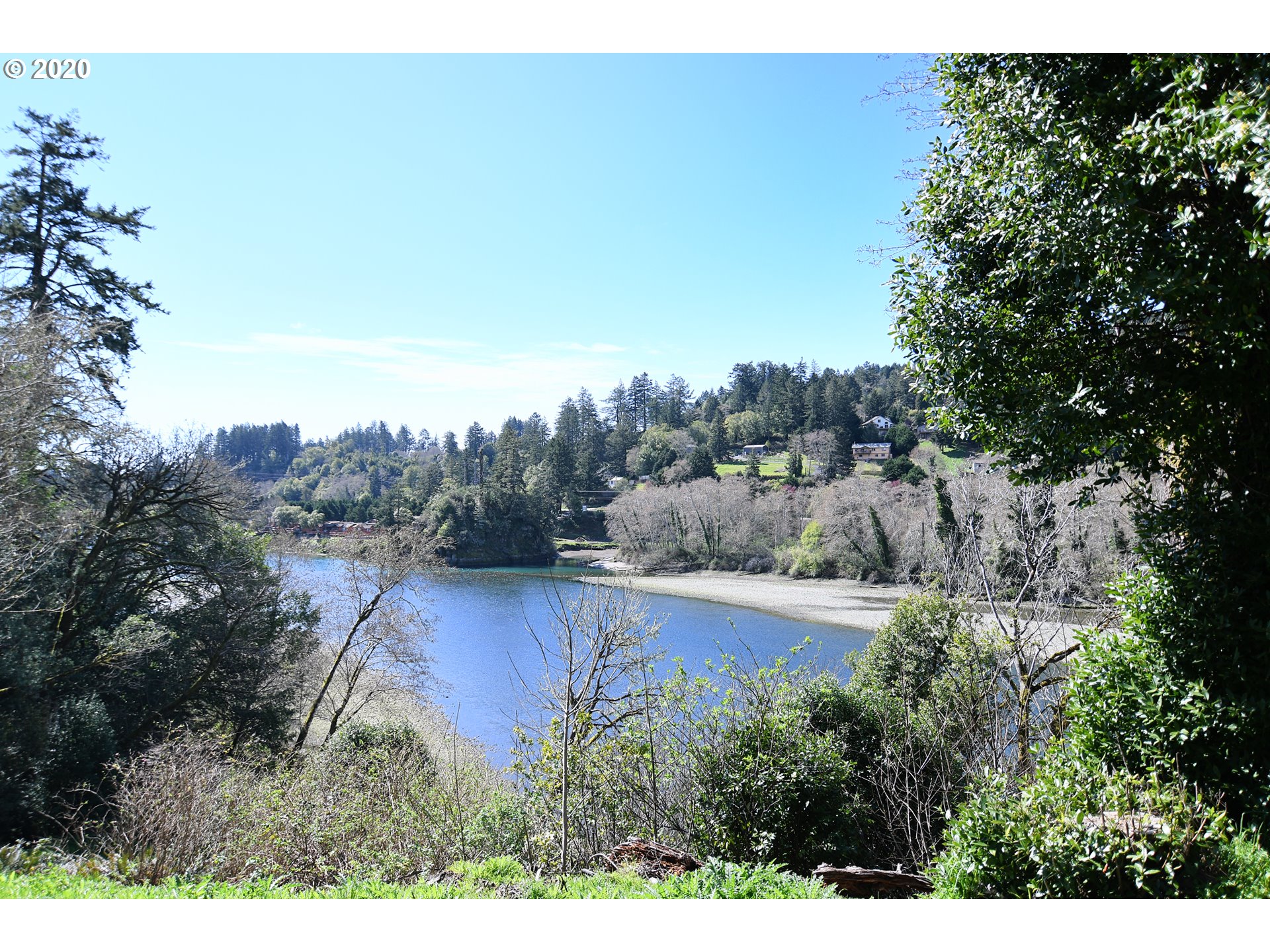 South Bank Chetco Road Brookings, OR 97415 - Photo 20 of 20 a view of a city with lush green forest