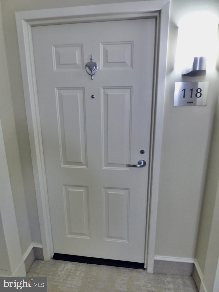 11800 Sunset Hills Road, Unit 118 Reston, VA 20190 - Photo 3 of 52 Inviting entrance to Room 118