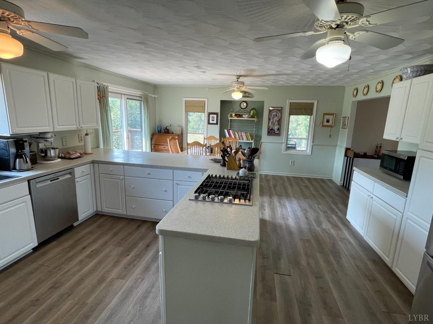 4063 Bore Auger Road Blue Ridge, VA 24064 - Photo 42 of 90 a kitchen with sink a stove and cabinets