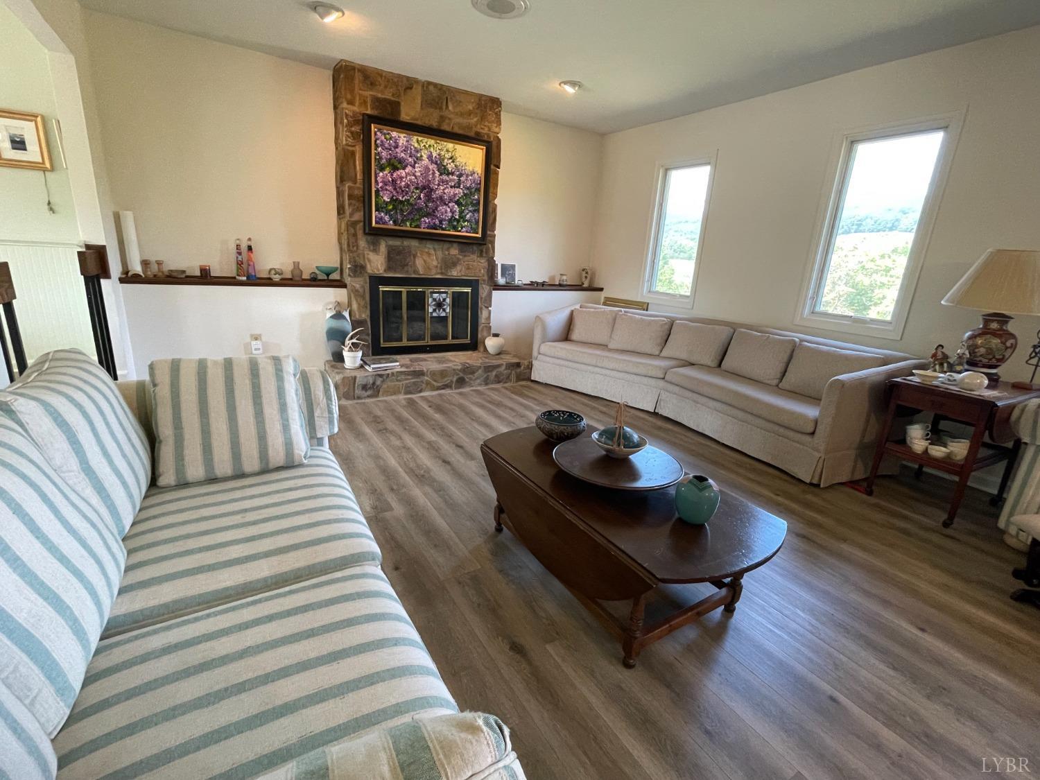 4063 Bore Auger Road Blue Ridge, VA 24064 - Photo 57 of 90 a living room with furniture and a flat screen tv