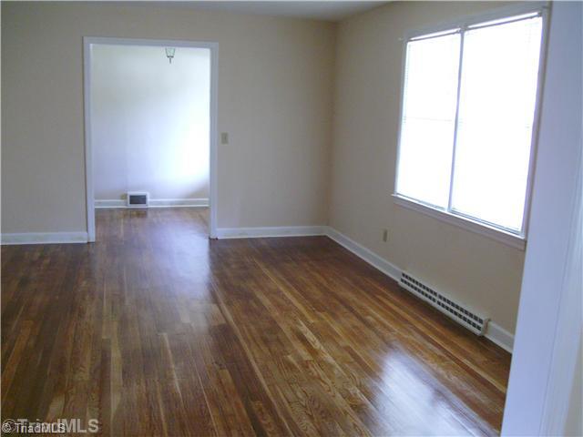 501 Alpine Road Winston-Salem, NC 27104 - Photo 8 of 9 Living Room. Nice big living room with wood floors and big entrance