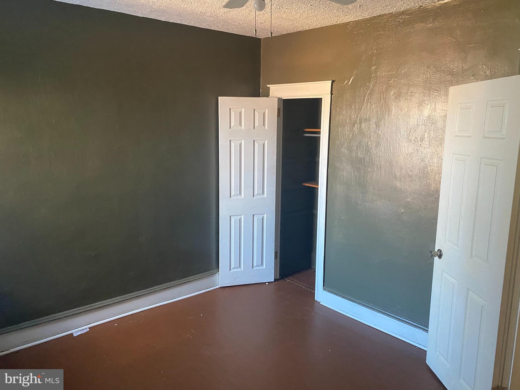 89 Lamport Road Upper Darby, PA 19082 - Photo 14 of 22 an empty room with windows and entrance