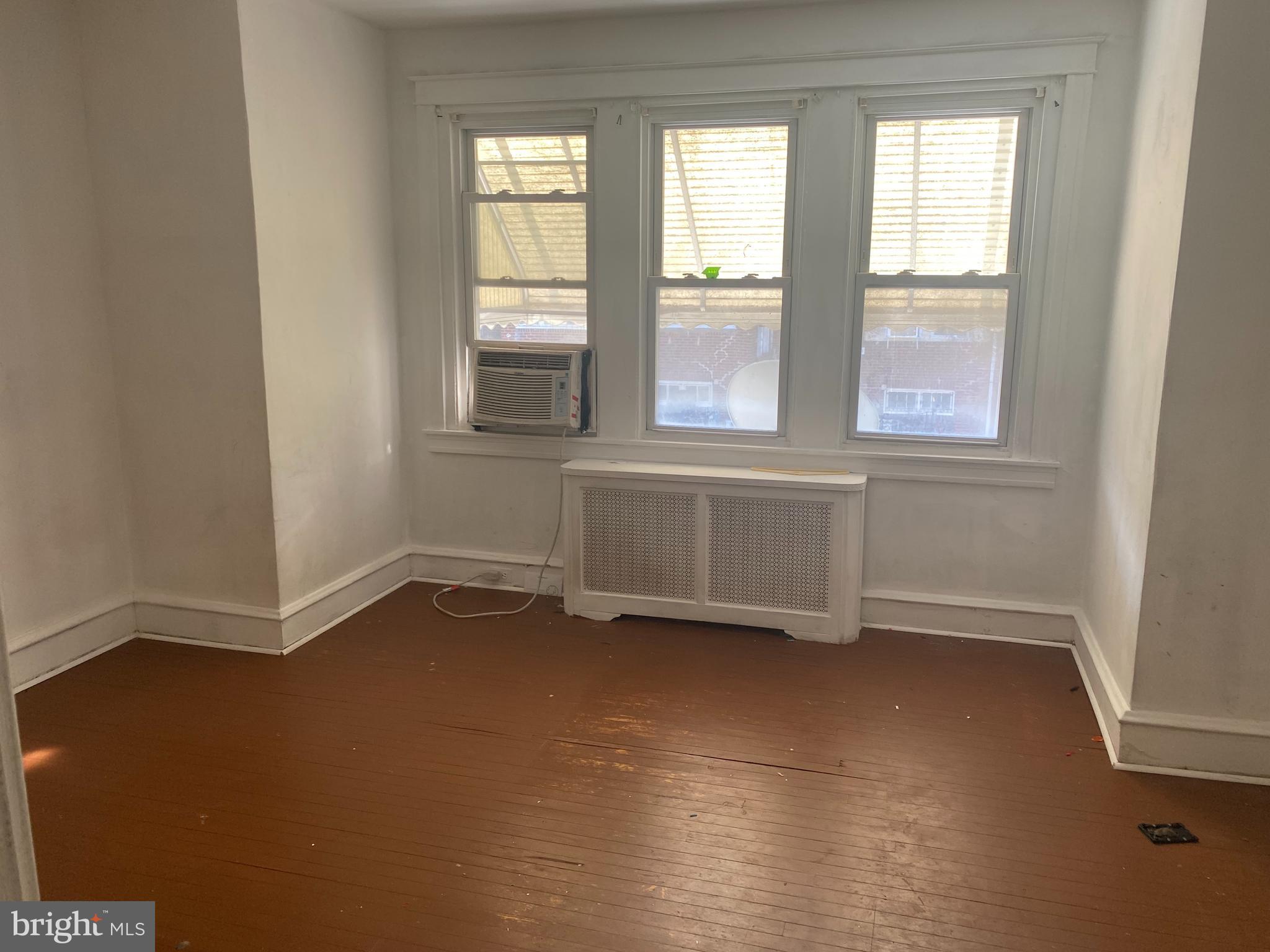 89 Lamport Road Upper Darby, PA 19082 - Photo 17 of 22 an empty room with windows