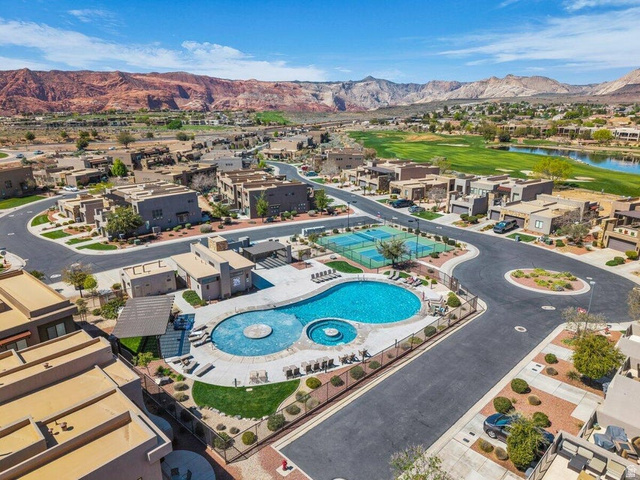 5010 Escapes Drive St. George, UT 84770 - Photo 38 of 46 Aerial perspective of suburban area with a pool and a water and mountain view